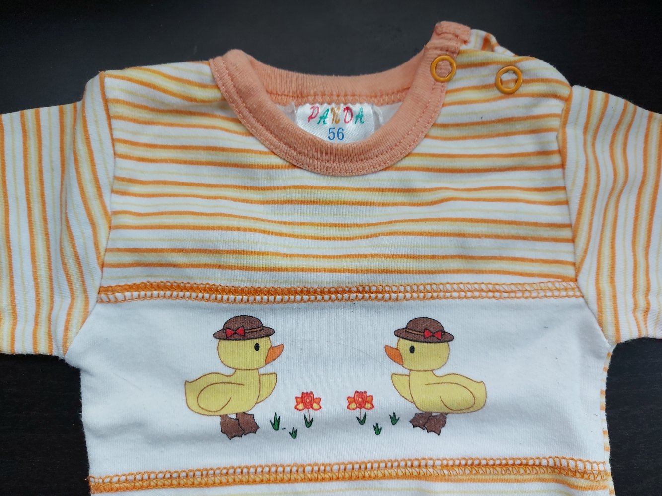 orange-weiß gestreifter Langarmbody mit Küken Gr. 56 unisex geschlechtsneutral