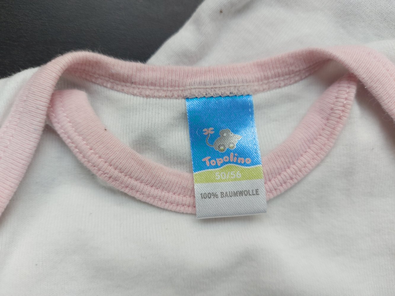 Weiß-rosa Kurzarmbody Der neue Mittelpunkt Gr. 50/56