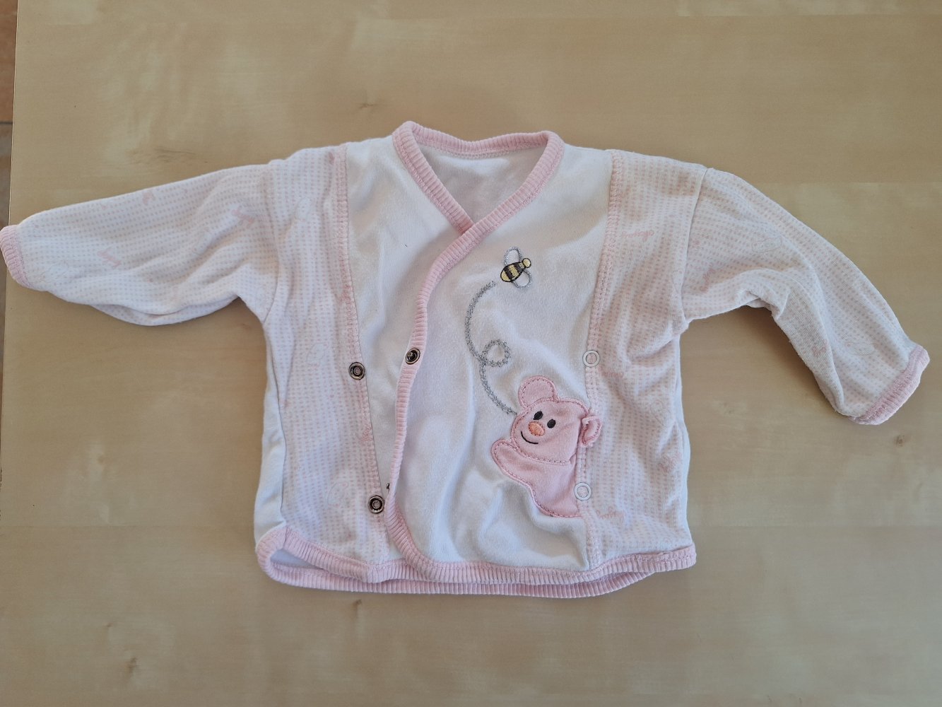 weiß-rosa Wickeljäckchen 