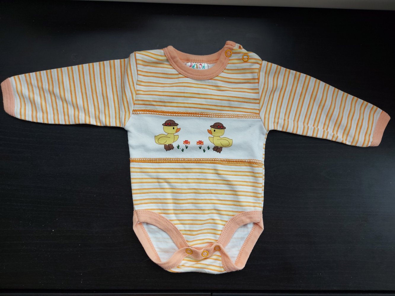 orange-weiß gestreifter Langarmbody mit Küken Gr. 56 unisex geschlechtsneutral