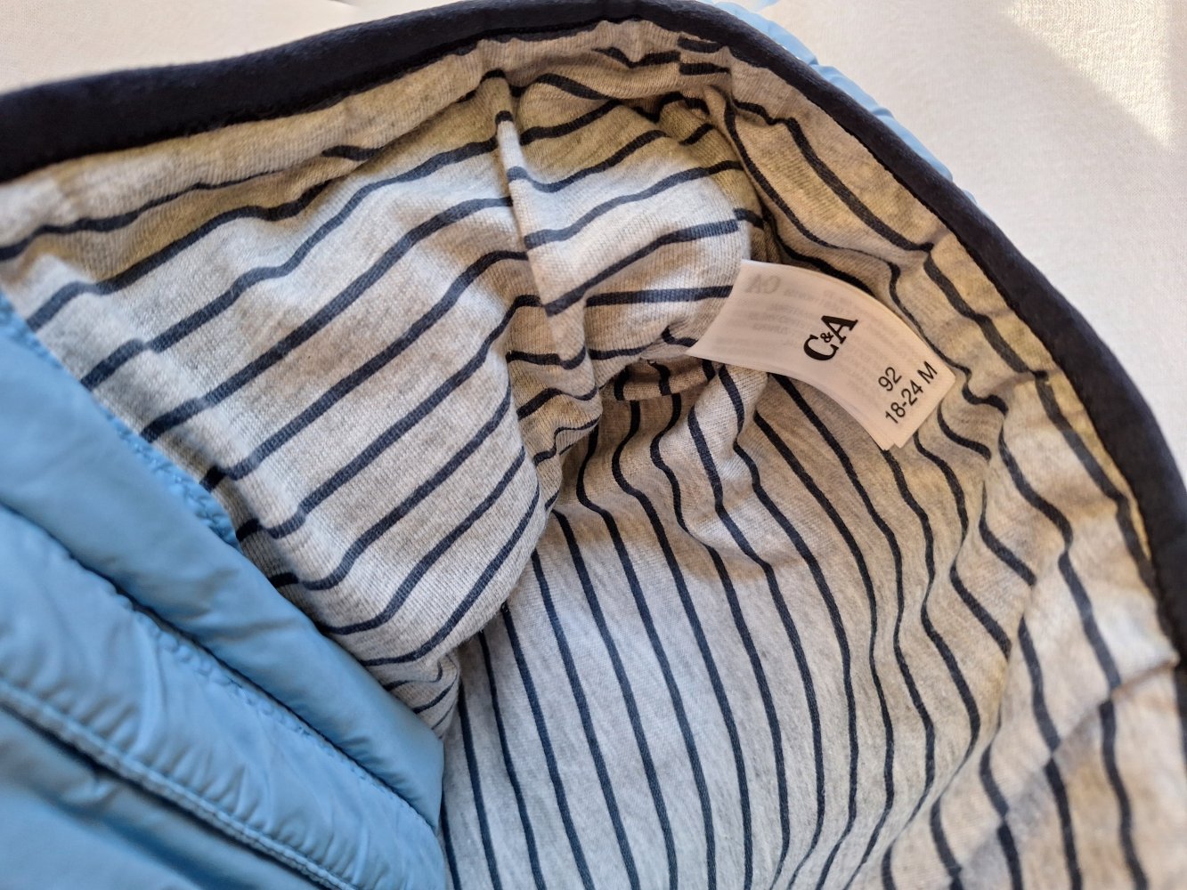 hellblaue Steppweste mit Kapuze und Reißverschluss, Gr. 92 Übergangsjacke