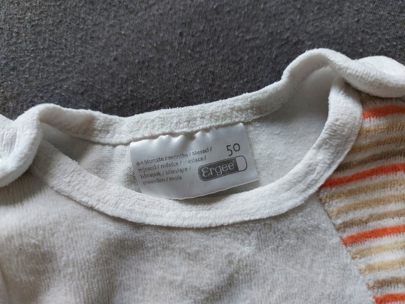 weißer Babystrampler mit Tiermotiven, Gr. 50