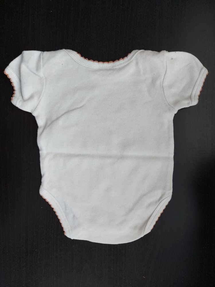 Niedlicher Kurzarmbody mit Mariechenkäfern Gr. 50/56