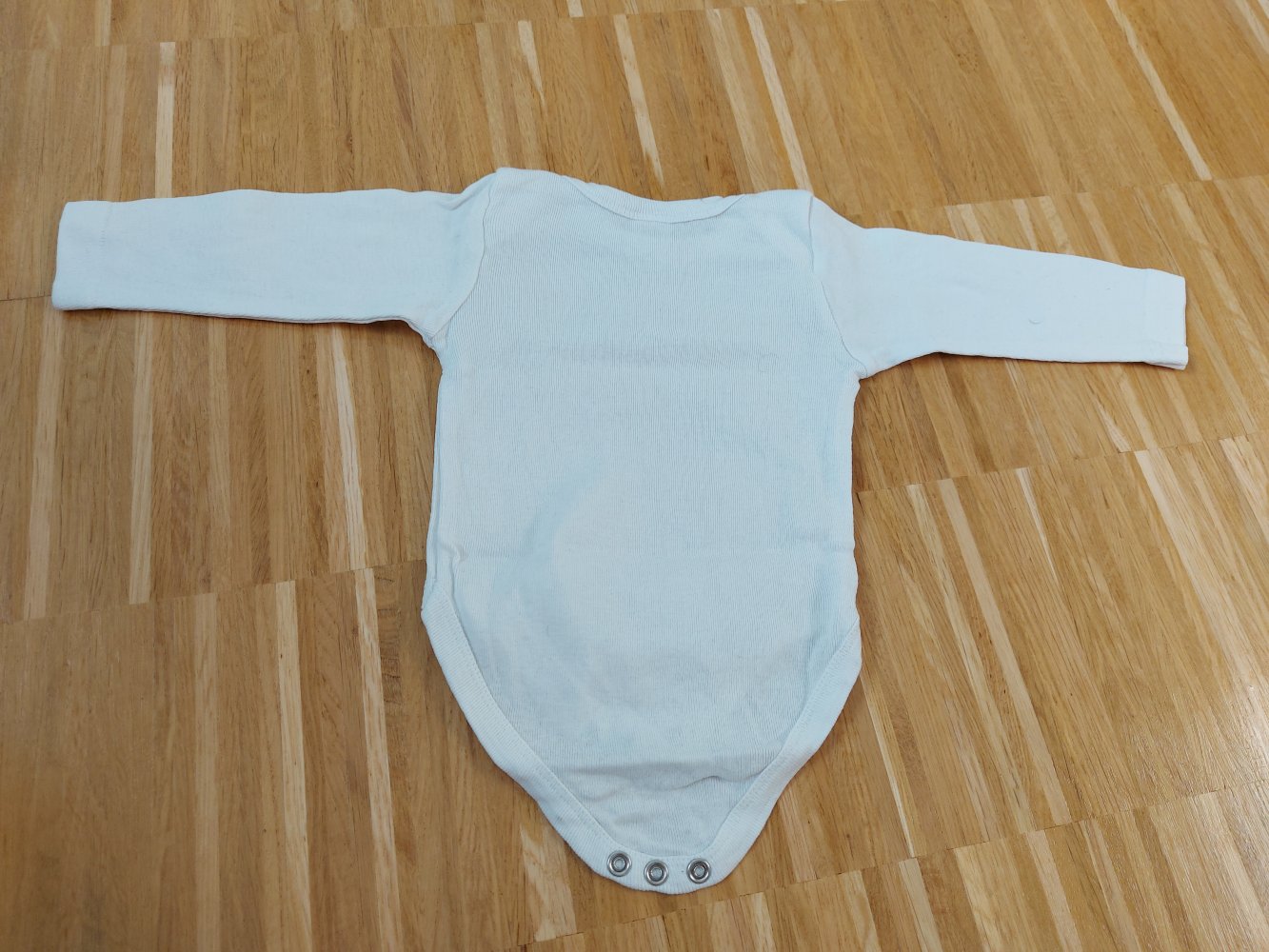 weißer Langarmbody Gr. 50/56