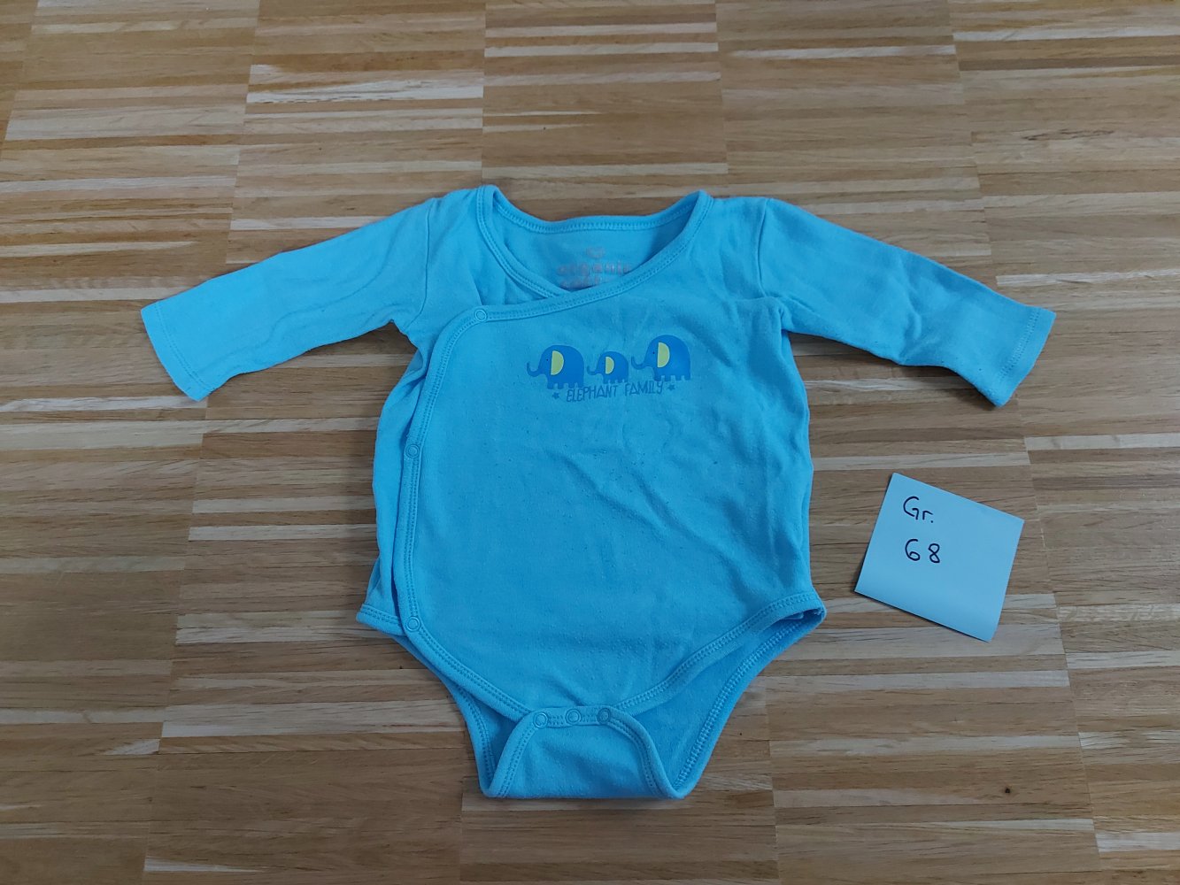 blauer Langarm-Wickelbody mit Elefantenmotiv 