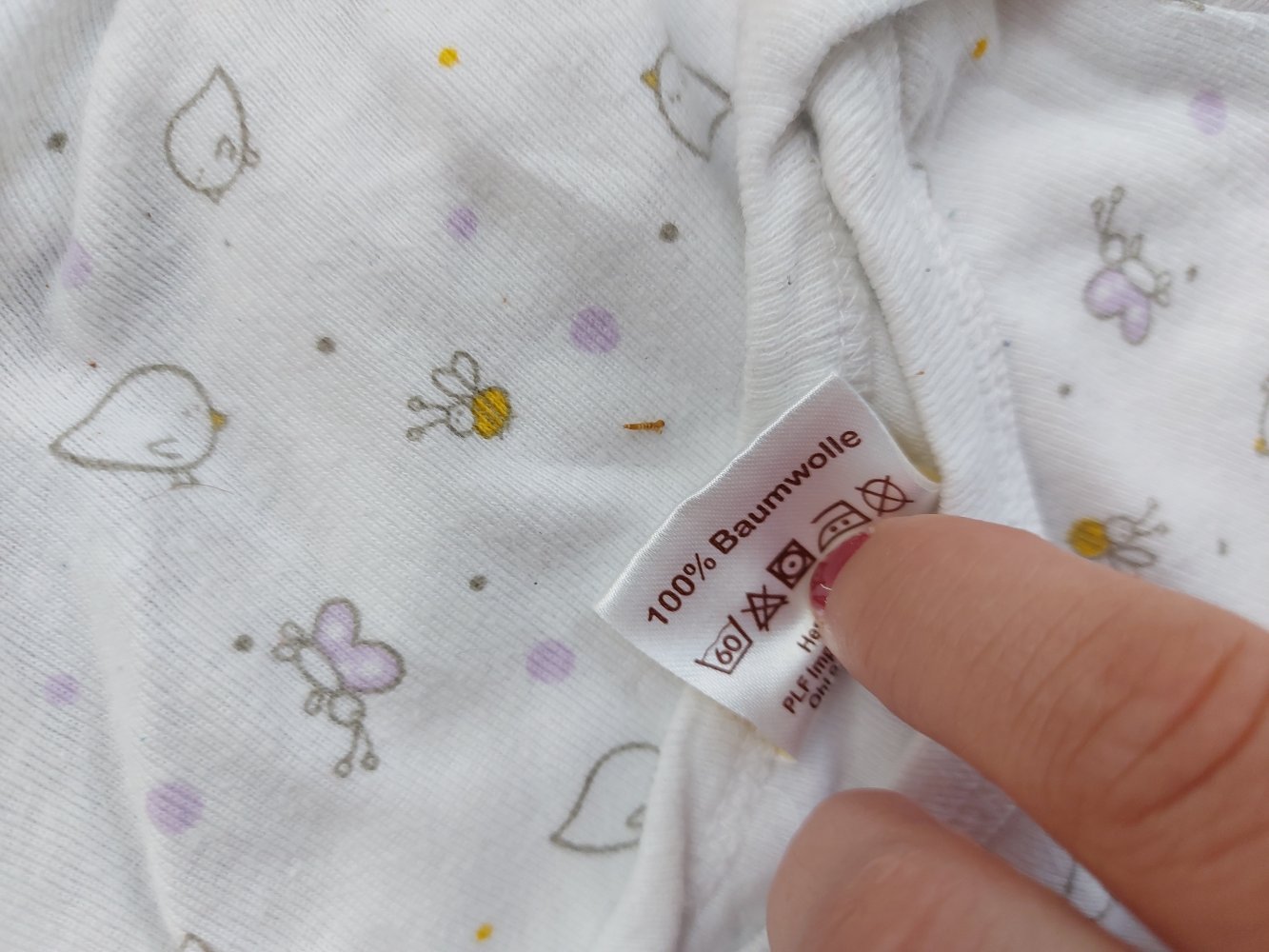 Niedlicher Kurzarmbody mit Frühlingsmotiven, Gr. 50/56