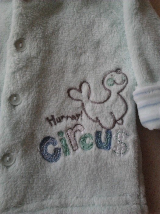 Sehr süßes flauschiges Jäckchen Gr.50/56 