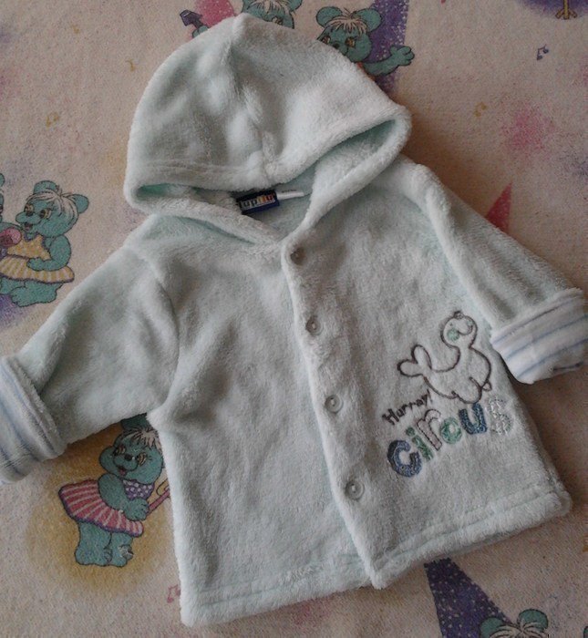 Sehr süßes flauschiges Jäckchen Gr.50/56 