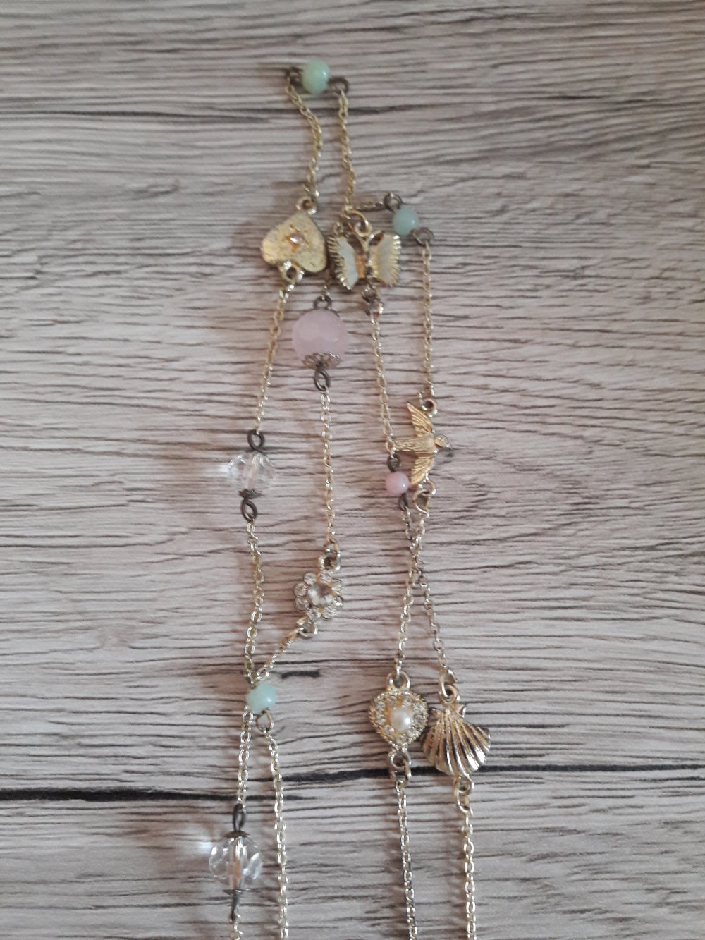 lange verspielte Kette - gold - Herzen - Muscheln - Schwalben - Perlen