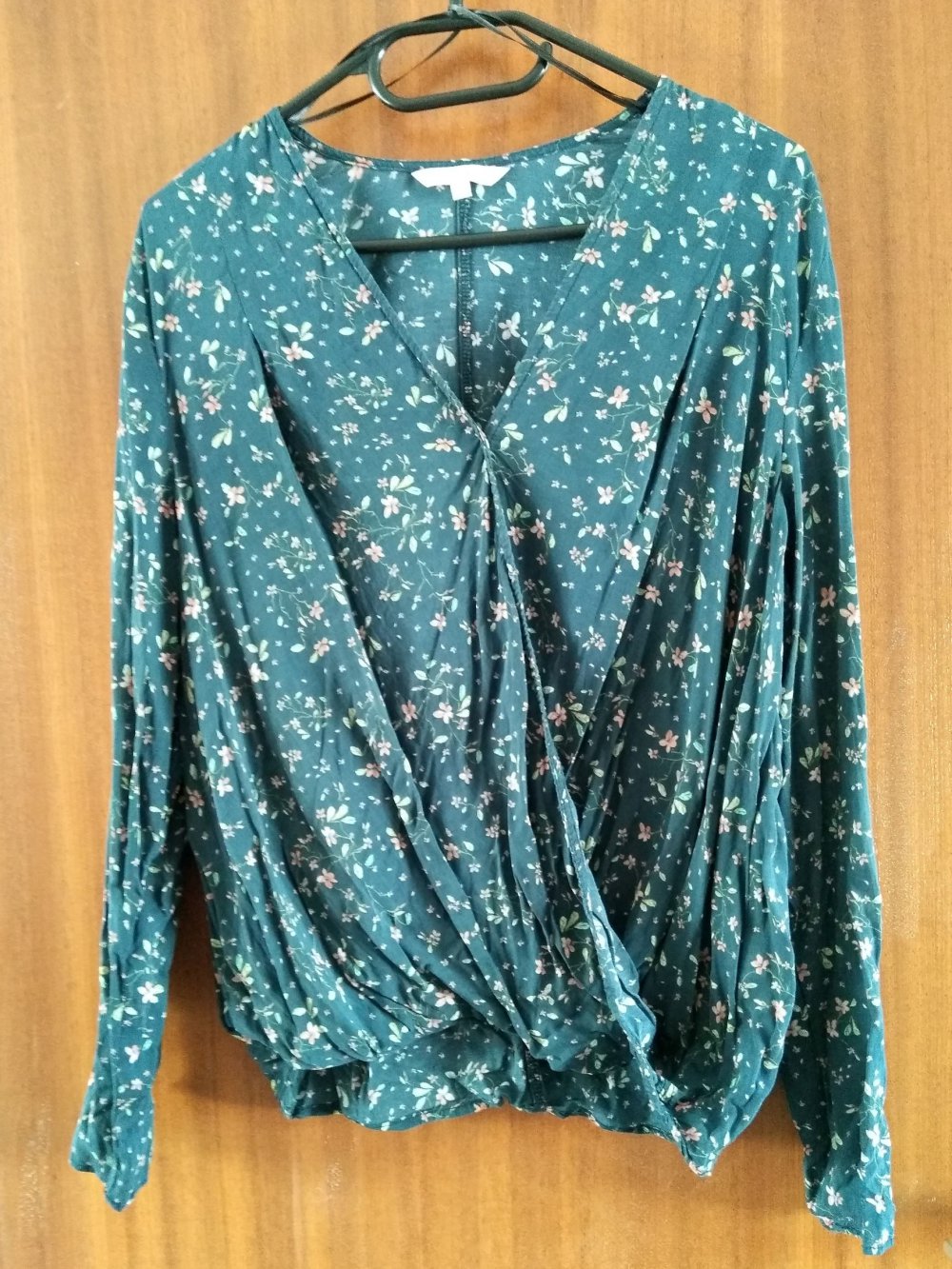 petrol farbende Bluse in Wickeloptik