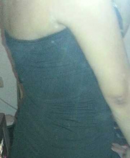 Schwarzes Minikleid mit Pailletten 