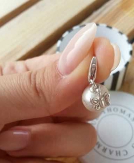 *Thomas Sabo* Charm - weiße Perle mit Schmetterling
