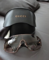 Dunkelbraune Sonnenbrille von Gucci