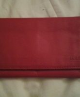 his geldbeutel  ok soweit geldfach etwas stoff zerriessen aber  hatt  keine  Einschränkung